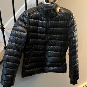 SAM black packable down jacket.